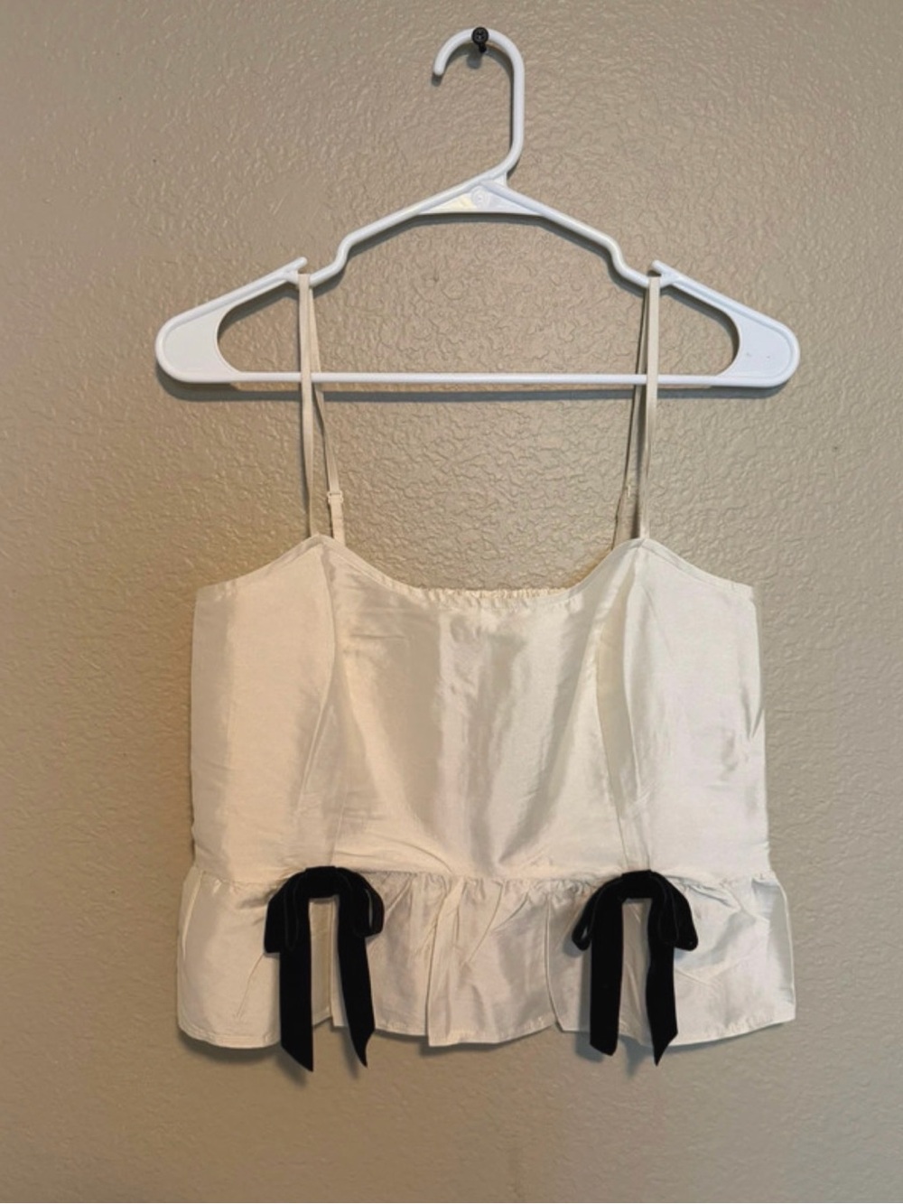 NWT Sleeveless Cream Ruffle Hem Cami Top with Bow Detail